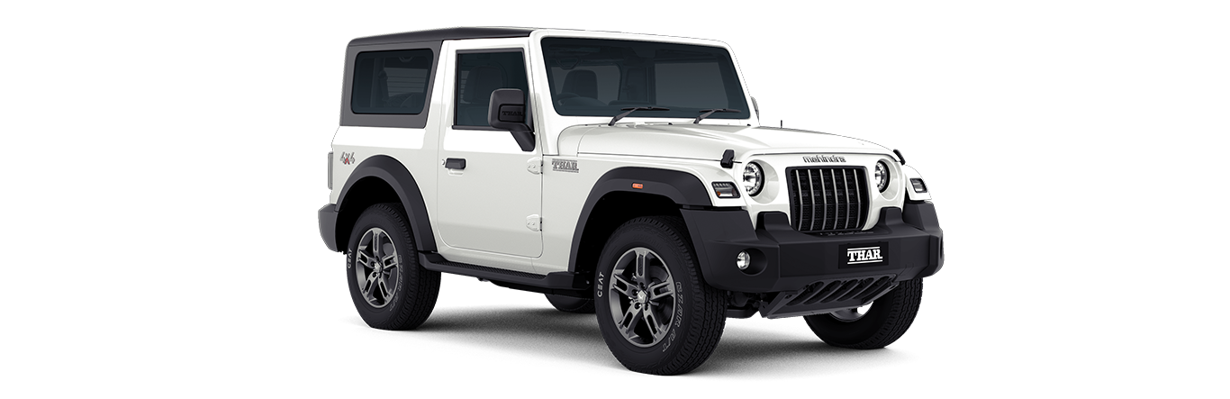 The Thar’s boxy, Jeep-inspired design is its signature, and the facelift doesn’t tamper with that rugged charm. Instead, it borrows a dash of style from the Thar Roxx to feel fresh yet familiar.